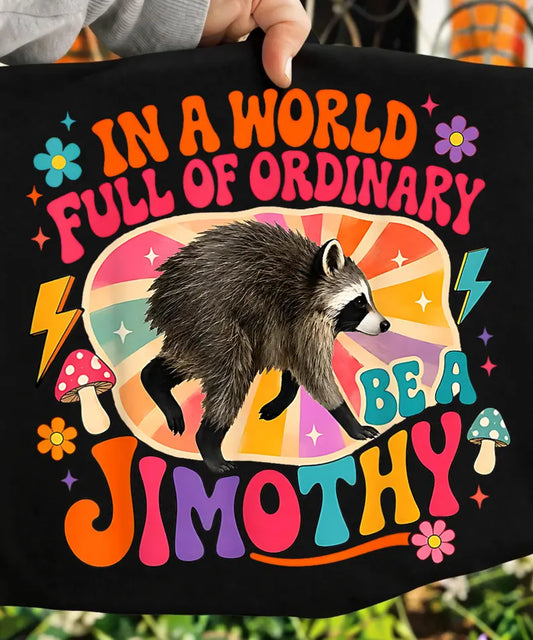 In a World Full of Ordinary, Be a Jimothy Raccoon Graphic AdultTee